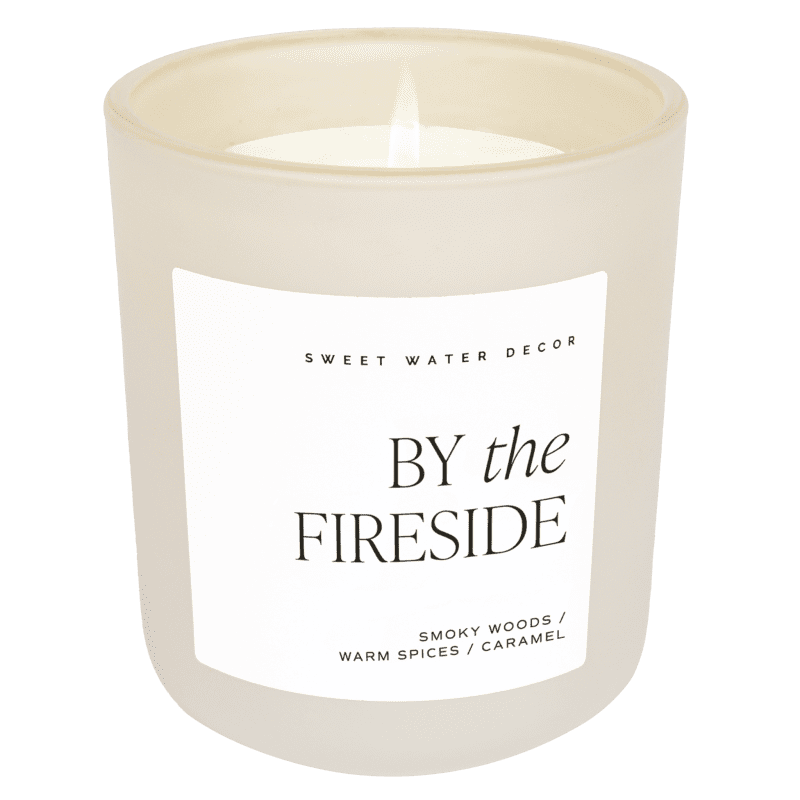 CL105 BY THE FIRESIDE 15OZ TAN MATTE CANDLE WB SOONA JUNE 2023 SWEET WATER DECOR 285403